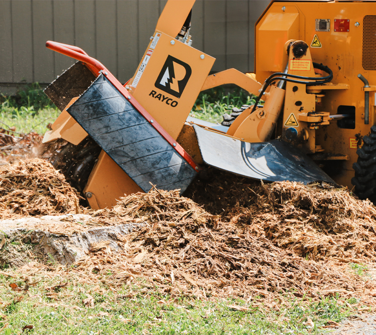 Rayco Stump Grinder Cutting a Tree Stump Below Grade Into Wood Chips for Stump Grinding in Frederick County, MD